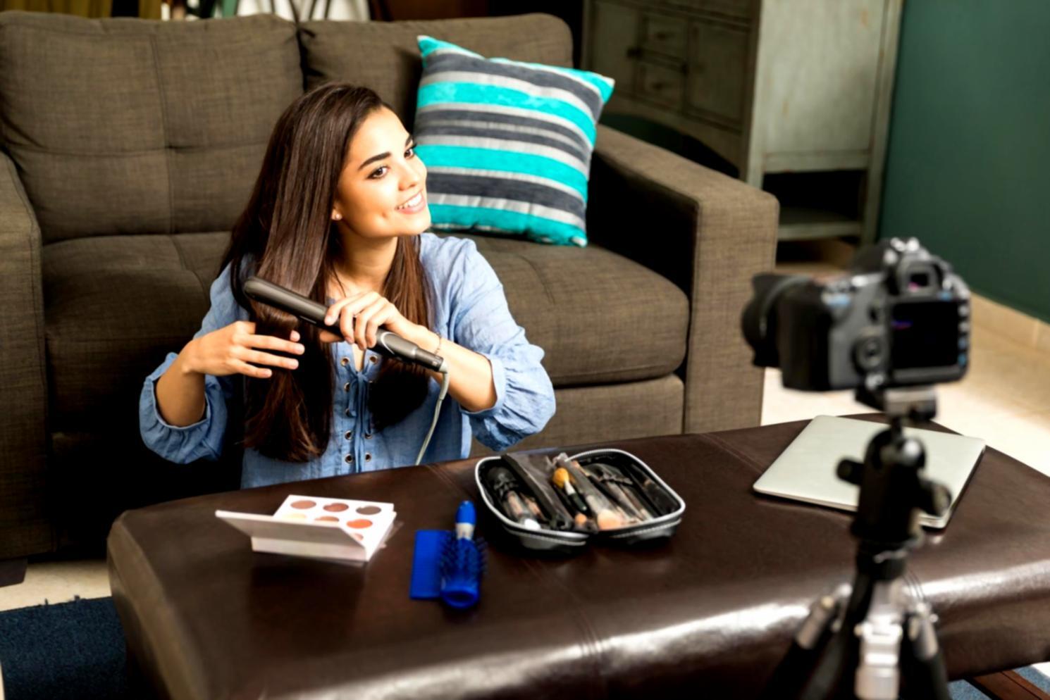 Professional colorist reviewing graded footage on calibrated monitor