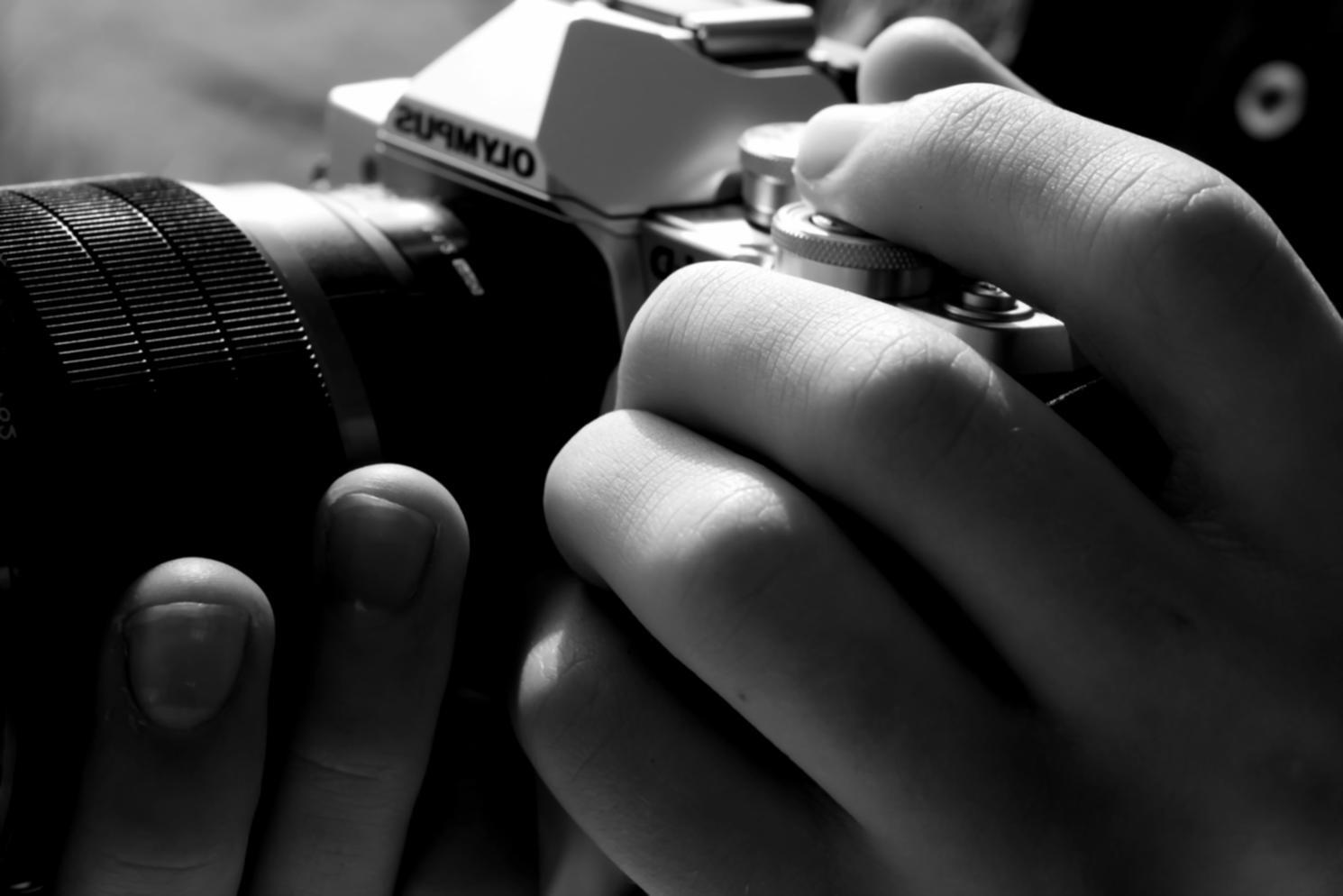 Professional color grading workspace with multiple monitors